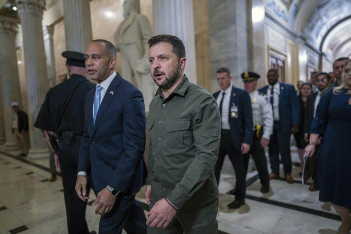 Ukrainian President Volodymyr Zelenskyy is welcomed to the Capitol in Washington, by House Minority Leader Hakeem Jeffries, D-N.Y., left, Thursday, Sept. 21, 2023. It is Zelenskyy's second visit to Washington since Russia invaded and comes as President Joe Biden's request to Congress for an additional $24 billion for Ukraine is hanging in the balance. (AP Photo/J.