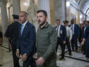 Ukrainian President Volodymyr Zelenskyy is welcomed to the Capitol in Washington, by House Minority Leader Hakeem Jeffries, D-N.Y., left, Thursday, Sept. 21, 2023. It is Zelenskyy's second visit to Washington since Russia invaded and comes as President Joe Biden's request to Congress for an additional $24 billion for Ukraine is hanging in the balance. (AP Photo/J.