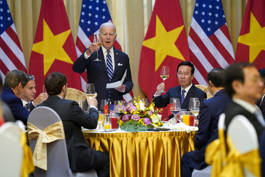 U.S. President Joe Biden raises a toast as he participates in a State Luncheon with Vietnam President Vo Van Thuong in Hanoi, Vietnam, Monday, Sept. 11, 2023.