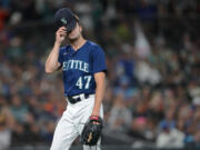 Seattle Mariners relief pitcher Matt Brash walks off the field after pitching to the Houston Astros during the seventh inning of a baseball game Wednesday, Sept. 27, 2023, in Seattle.
