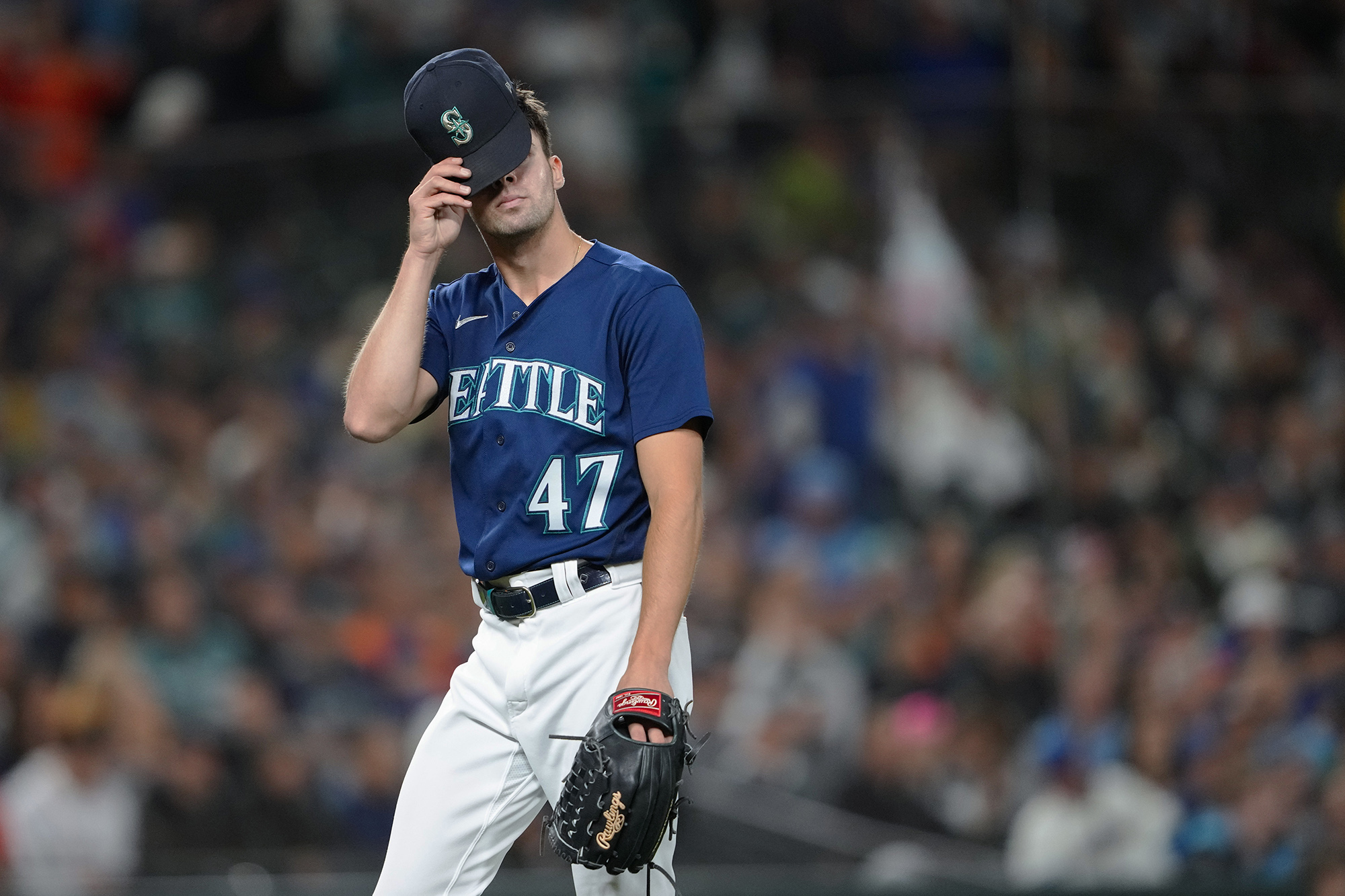 Seattle Mariners relief pitcher Matt Brash walks off the field after pitching to the Houston Astros during the seventh inning of a baseball game Wednesday, Sept. 27, 2023, in Seattle.