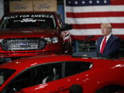 FILE - President Donald Trump speaks at Ford's Rawsonville Components Plant that has been converted to making personal protection and medical equipment, Thursday, May 21, 2020, in Ypsilanti, Mich. Former President Donald Trump will skip the second GOP presidential debate next week to travel to Detroit as the auto worker strike enters its second week.