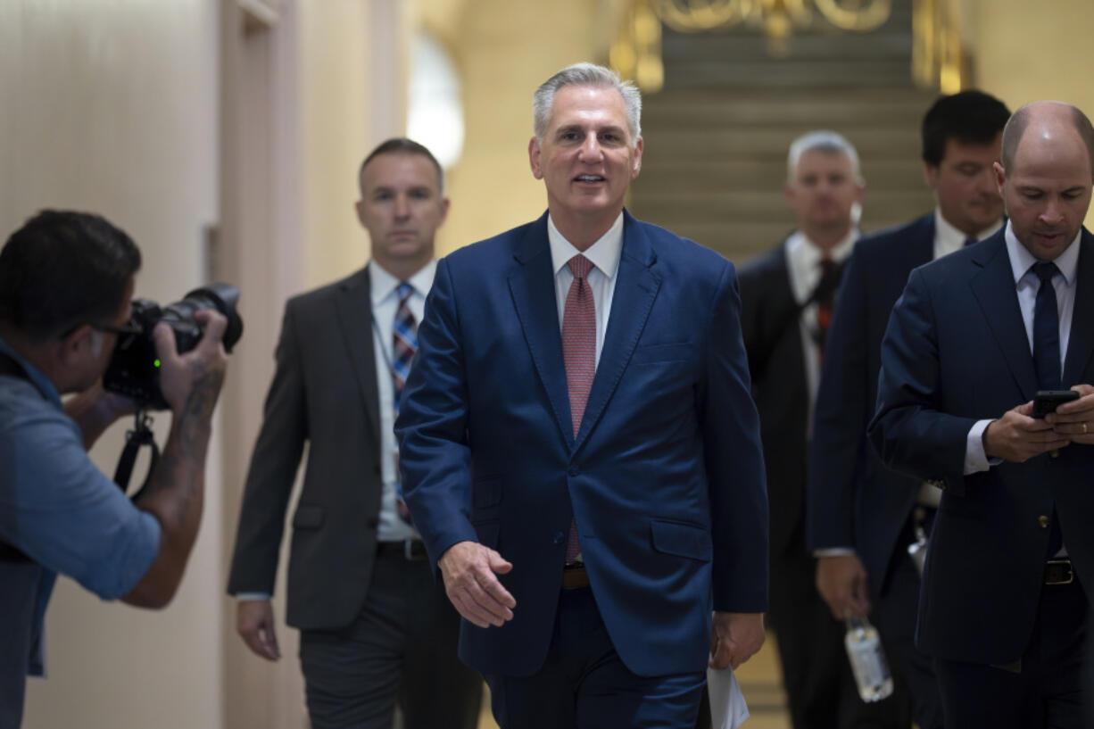 Speaker of the House Kevin McCarthy, R-Calif., arrives to meet with the House Republican Conference about launching an impeachment inquiry into President Joe Biden, at the Capitol in Washington, Thursday, Sept. 14, 2023. (AP Photo/J.