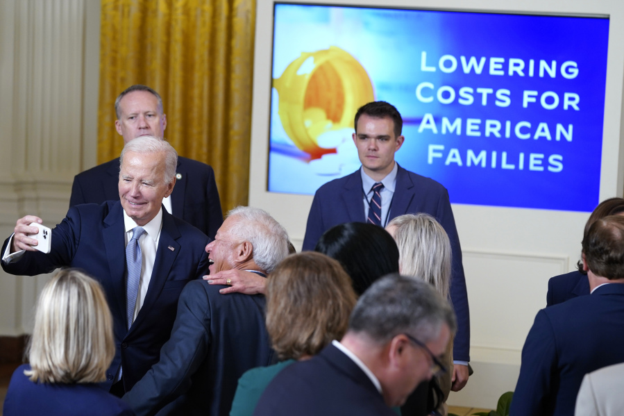 President Joe Biden greets people after speaking during an event on prescription drug costs, in the East Room of the White House, Tuesday, Aug. 29, 2023, in Washington.
