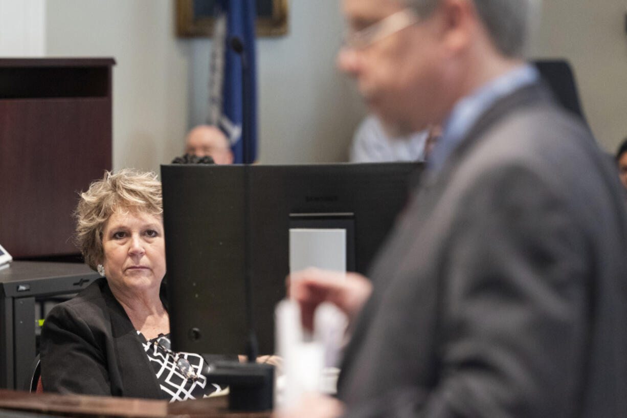 Colleton County Clerk of Court Rebecca Hill listens March 1 as Prosecutor Creighton Waters makes closing arguments in Alex Murdaugh's trial for murder at the Colleton County Courthouse in Columbia, S.C.