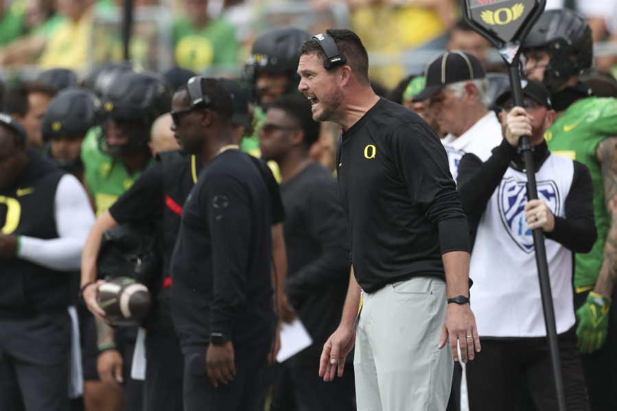 Oregon head coach Dan Lanning calls out to players during the first half of an NCAA football game against Colorado, Saturday, Sept. 23, 2023, in Eugene, Ore.