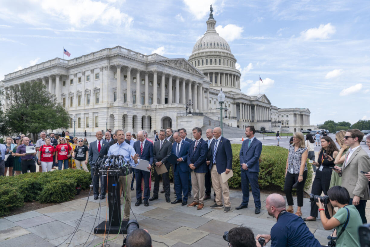 FILE - Rep. Scott Perry, R-Pa., speaks joined by other lawmakers from the conservative House Freedom Caucus, the conservatives who are challenging Speaker McCarthy on the government funding bill, during a news conference outside the Capitol in Washington, Tuesday, Sept.