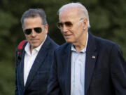 FILE - President Joe Biden, and his son Hunter Biden arrive at Fort McNair, Sunday, June 25, 2023, in Washington.