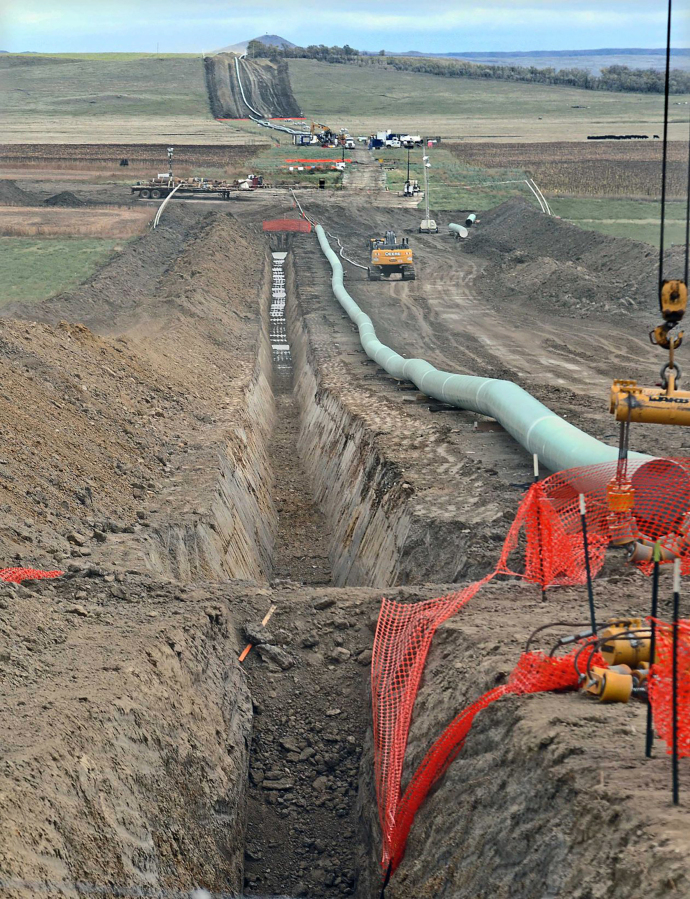 FILE - In this October 2016, file photo, construction continues on the Dakota Access Pipeline. Federal officials on Friday, Sept. 8, 2023, released a draft environmental review of the Dakota Access oil pipeline without a recommendation from five options for the future of the line's controversial river crossing in North Dakota, proposals which include an extensive reroute miles upstream.