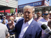 Republican presidential candidate former President Donald Trump speaks while visiting the Iowa Pork Producers tent at the Iowa State Fair, Saturday, Aug. 12, 2023, in Des Moines, Iowa.