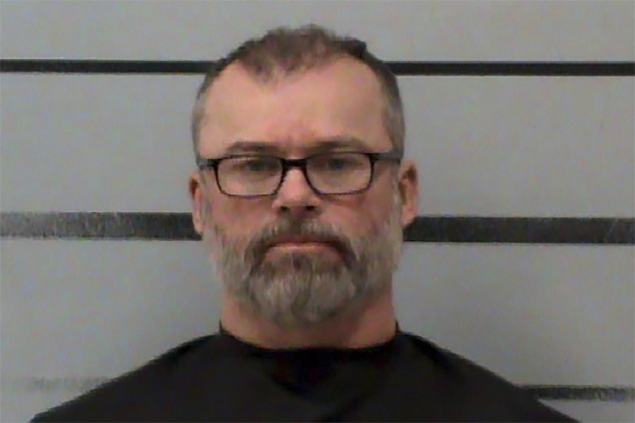 FILE - This image provided by the Lubbock County Detention Center shows Frederick Francis Goltz, 52, of Lubbock, Texas. Goltz, who advocated for a mass shooting of poll workers and threatened two Arizona officials and their children, was sentenced to 3 1/2 years in federal prison, prosecutors said Friday, Aug. 4, 2023.