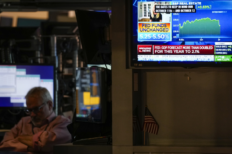 A monitor displays information about Federal Reserve interest rate on the floor at the New York Stock Exchange in New York, Wednesday, Sept. 20, 2023. The Federal Reserve left its key interest rate unchanged for the second time in its past three meetings, a sign that it's moderating its fight against inflation as price pressures have eased.
