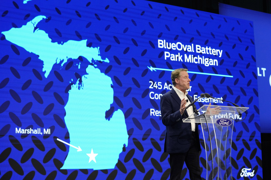 FILE - Ford Motor Co. Executive Chairman Bill Ford announces the automaker's new BlueOval Battery Park, Feb. 13, 2023, in Romulus, Mich. Ford Motor Co. said Monday, Sept. 25, that it's pausing construction of the $3.5 billion electric vehicle battery plant in Michigan until it is confident it can run the factory competitively.