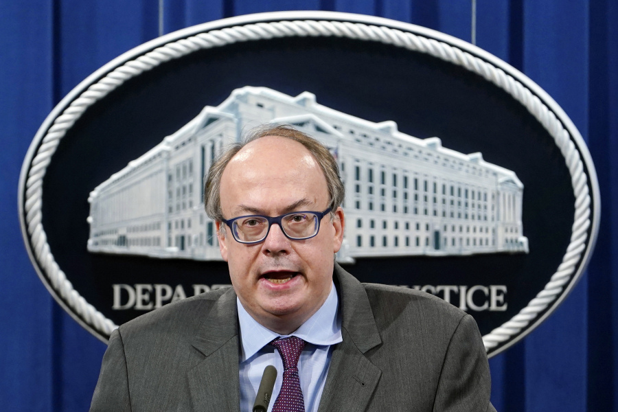 FILE - Jeffrey Clark, Assistant Attorney General for the Environment and Natural Resources Division, speaks during a news conference at the Justice Department in Washington, on Sept. 14, 2020. A federal judge who rejected efforts by former Trump White House chief of staff Mark Meadows to move his charges in the Georgia election subversion case to federal court is set to hear arguments on Monday, Sept. 18, 2023, from former Justice Department official Jeffrey Clark on the same issue.