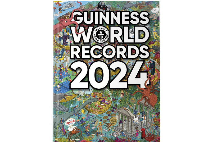 This image shows cover art for the latest edition of the Guinness World Records. The 2024 edition has taken our watery world as its theme. That means there's entries for the largest octopuses, largest hot spring and deepest shark among the 2,638 achievements.