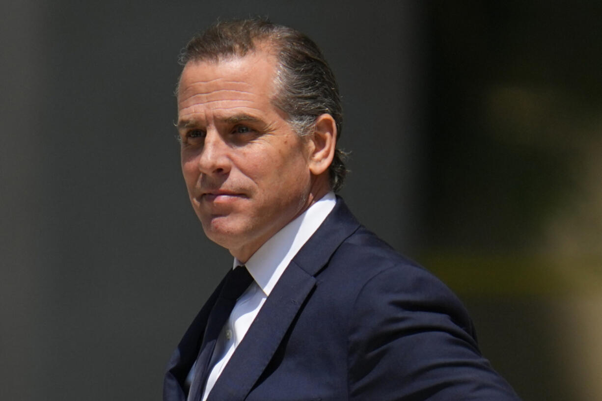 FILE - President Joe Biden's son Hunter Biden leaves after a court appearance, July 26, 2023, in Wilmington, Del. Hunter Biden has filed a lawsuit against the Internal Revenue Service, arguing that two agents violated his right to privacy when they publicly aired his tax information as they pressed claims that a federal investigation into him had been improperly handled. The lawsuit filed Monday says that his personal tax details shared during congressional hearings and interviews was not allowed by whistleblower protections.