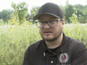 In tihs image taken from video, Matthew Bussler, Tribal Historic Preservation Officer at Pokagon Band of Potawatomi Indians, speaks during an interview in Dowagiac, Mich., on Aug. 10, 2023. Americans whose ancestors called the state home hope a new state law will speed the recovery and reburial of ancestors' remains unearthed over the past two centuries. Bussler said it is critical that ancestors are returned "to the womb of Mother Earth," not only so they may continue their journey in the hereafter, but to "redeem all of the pain and the suffering" of their tribe, especially their descendants.