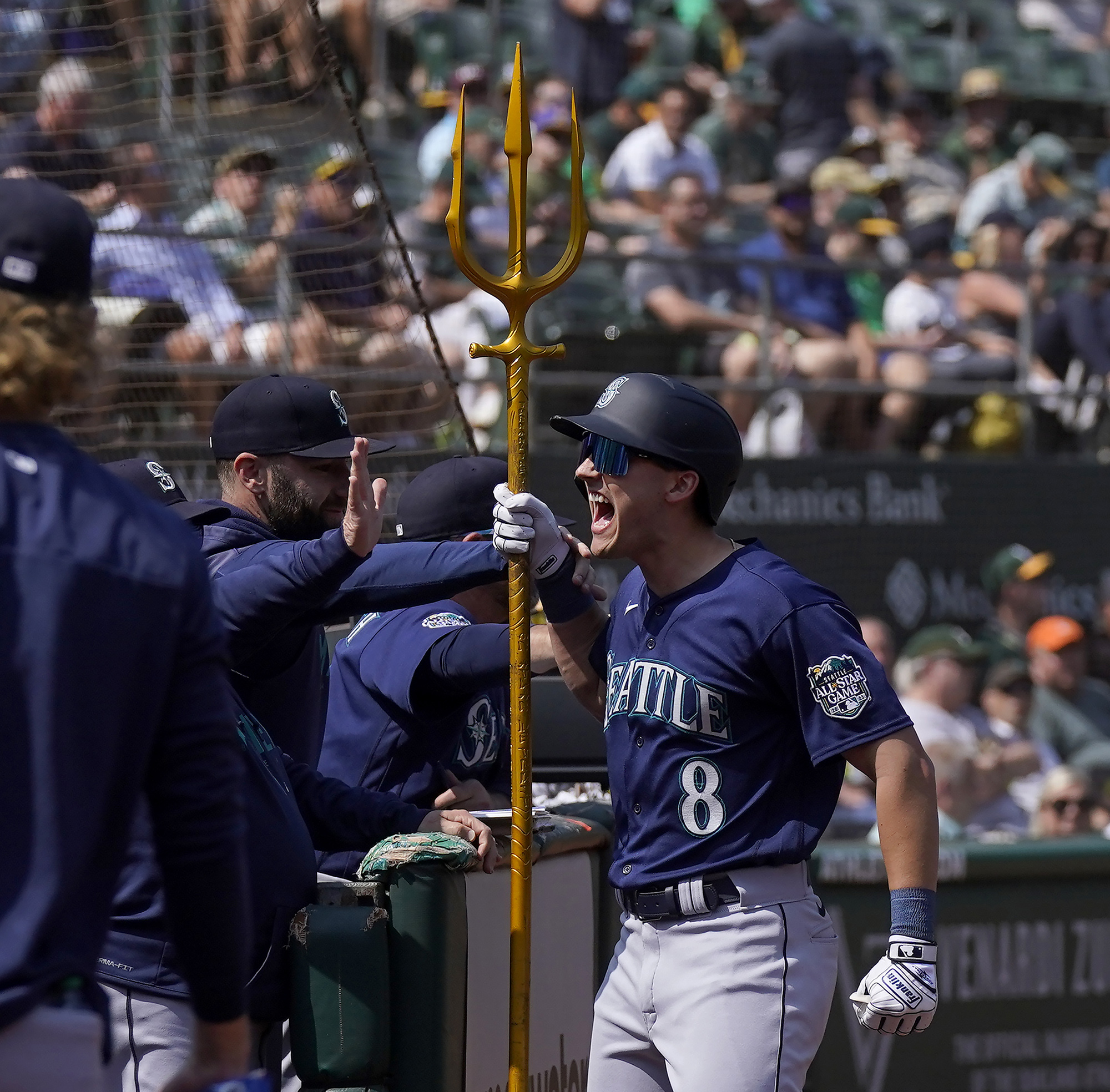 Mariners beat the A's 6-3 to keep pace with rivals