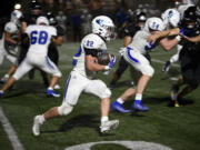 Mountain View’s Porter Drake (22) head downfield for a gain during Mountain View’s 42-27 win over Union at McKenzie Stadium on Friday, Sept. 15, 2023.