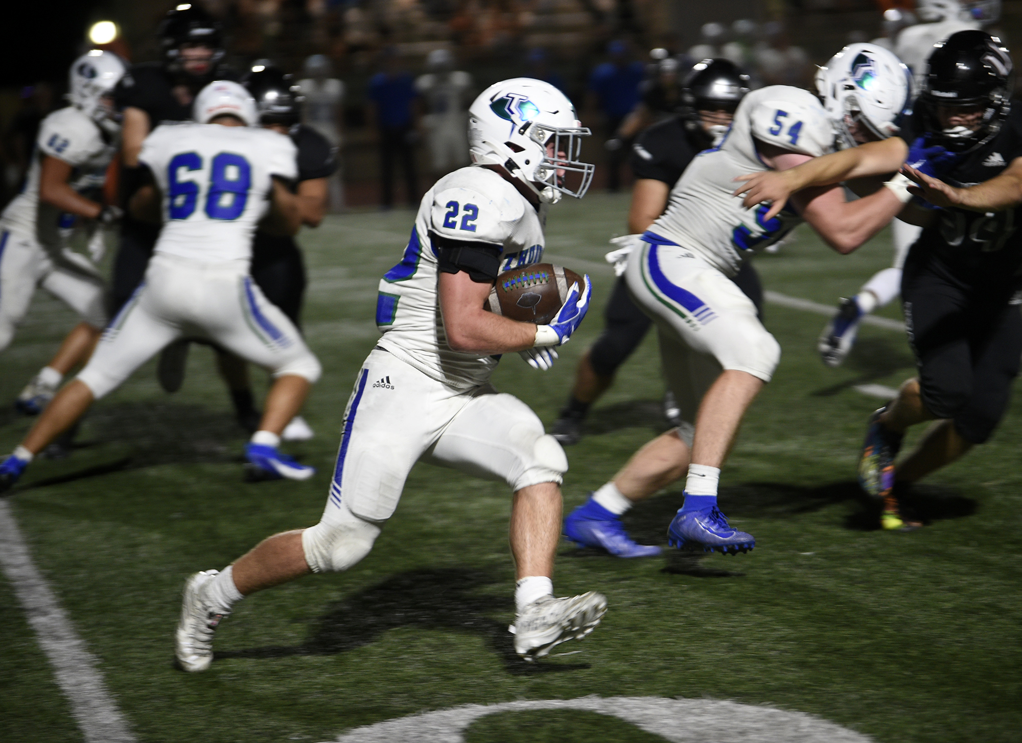 Mountain View’s Porter Drake (22) head downfield for a gain during Mountain View’s 42-27 win over Union at McKenzie Stadium on Friday, Sept. 15, 2023.