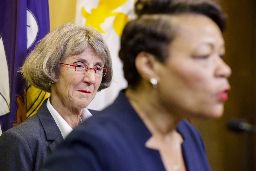 Anne Kirkpatrick, back left, listens as New Orleans Mayor LaToya Cantrell, right, announces Kirkpatrick as her nominee to head the New Orleans Police Department, at City Hall, Monday, Sept. 11, 2023.