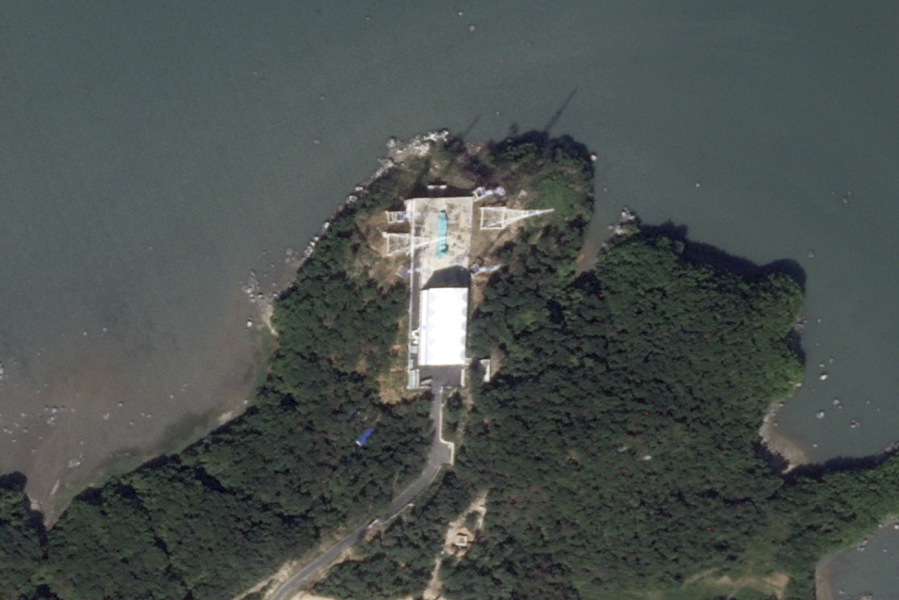In this satellite photo taken by Planet Labs PBC, a coastal launch pad is seen at the Sohae Satellite Launching Station in North Korea on Thursday, Sept. 7, 2023. A rail-mounted structure at the site, which covers its launch area, had been pulled back to expose the pad beneath, typically which happens ahead of a launch. North Korea has had two failed satellite launches this year, but has vowed to conduct a third.