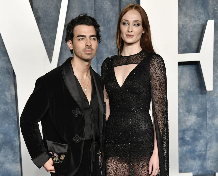 FILE - Joe Jonas, left, and Sophie Turner appear at the Vanity Fair Oscar Party on March 12, 2023, at the Wallis Annenberg Center in Beverly Hills, Calif. Jonas has filed for divorce from Turner after four years of marriage and two children. The 34-year-old Jonas Brothers singer filed to end his marriage with the 27-year-old star of "Game of Thrones" and "X-Men" actor on Tuesday, Sept. 5, 2023, in a Florida court.