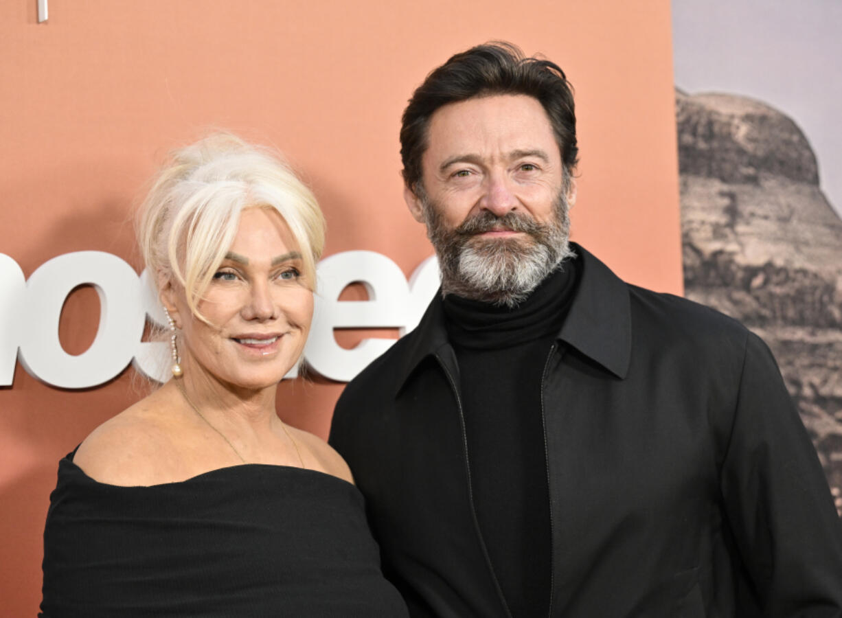 FILE - Hugh Jackman, right., and Deborra-Lee Furness Jackman attend the premiere of Apple Original Films' "Ghosted" in New York on April 18, 2023. Jackman and Deborra-lee Jackman have decided to end their marriage after 27 years and two children, the pair told People magazine Friday.