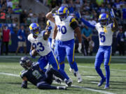 Los Angeles Rams running back Kyren Williams celebrates after scoring against the Seattle Seahawks during the second half of an NFL football game Sunday, Sept. 10, 2023, in Seattle.