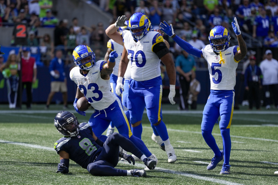 Los Angeles Rams running back Kyren Williams celebrates after scoring against the Seattle Seahawks during the second half of an NFL football game Sunday, Sept. 10, 2023, in Seattle.