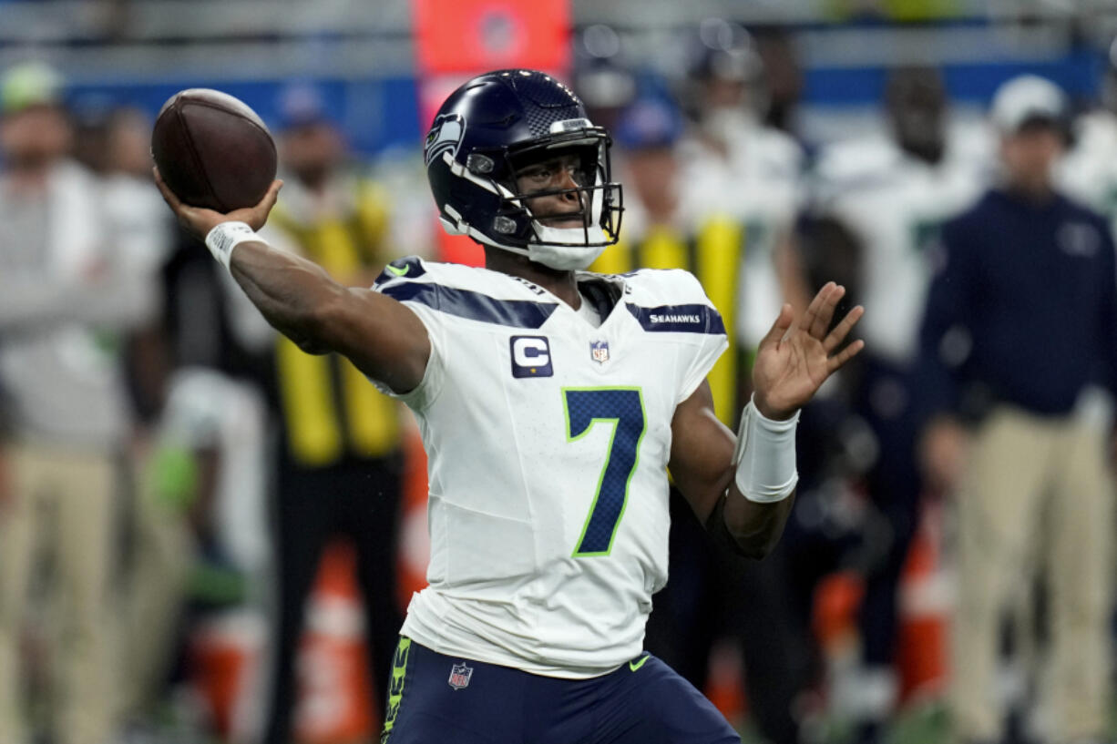 Seattle Seahawks quarterback Geno Smith (7) throws a pass during the first half of an NFL football game against the Detroit Lions, Sunday, Sept. 17, 2023, in Detroit.