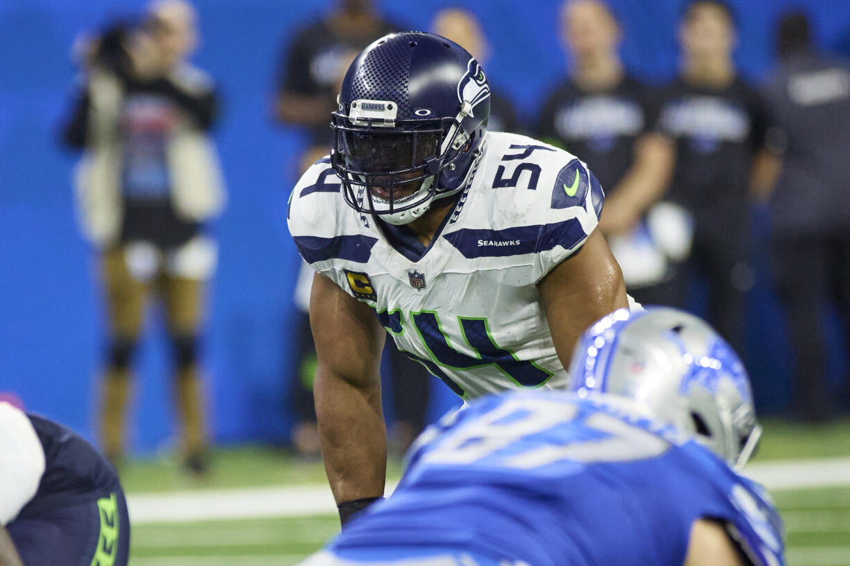 Seattle Seahawks linebacker Bobby Wagner (54) gets set on defense against the Detroit Lions during an NFL football game at Ford Field in Detroit, Sunday, Sept. 17, 2023.