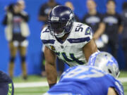 Seattle Seahawks linebacker Bobby Wagner (54) gets set on defense against the Detroit Lions during an NFL football game at Ford Field in Detroit, Sunday, Sept. 17, 2023.