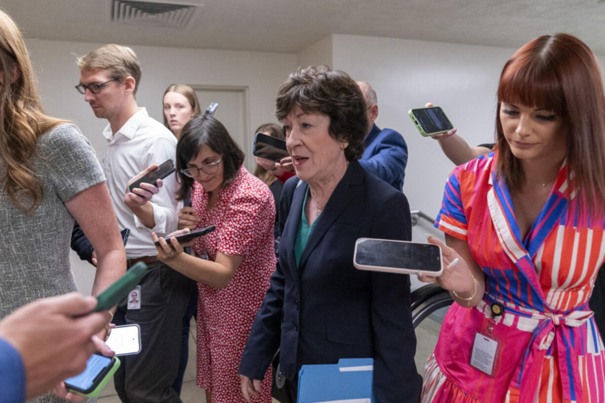 Sen. Susan Collins, R-Maine, speaks with reporters as she walks to a vote on Capitol Hill, Wednesday, Sept. 6, 2023 in Washington.