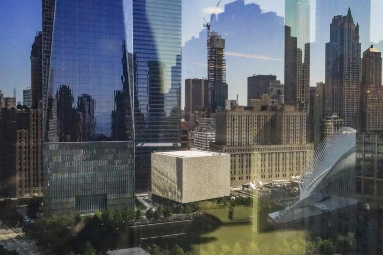 A box-shaped building, center, wrapped in translucent marble panels, is home to the new Perelman Performing Arts Center theater complex on the grounds of the World Trade Center, Wednesday Sept. 6, 2023, in New York.