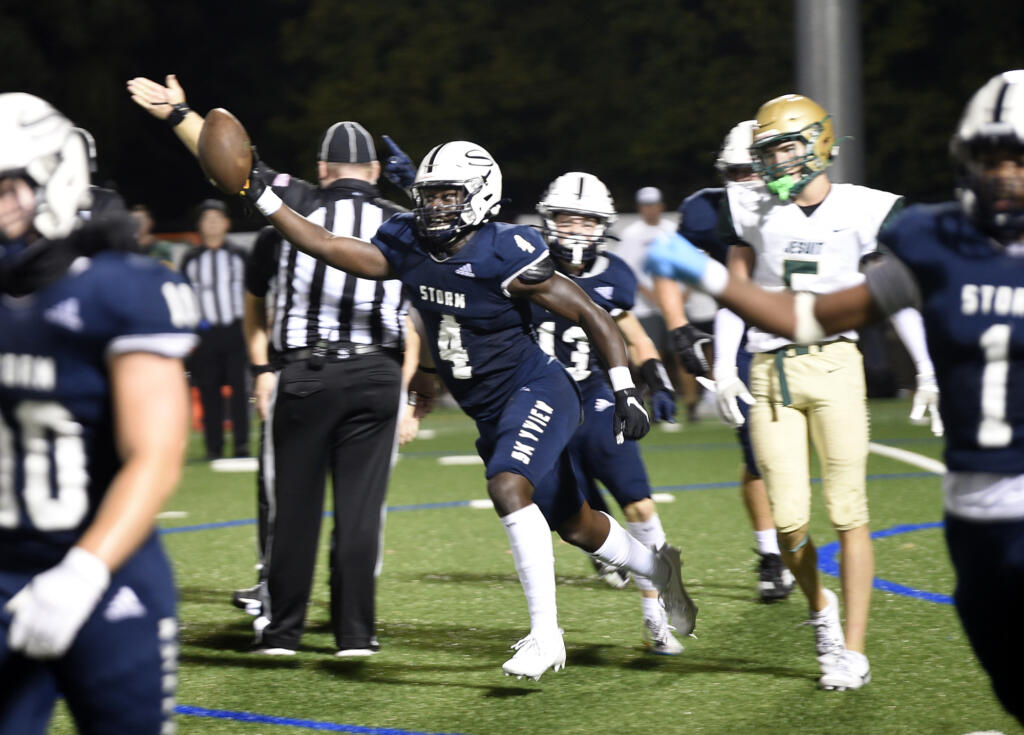 Skyview’s Andrew Orioro (4) holds up the ball after recovering a fumble in the Storm’s 28-0 win over Jesuit at Kiggins Bowl on Friday, Sept. 1, 2023.