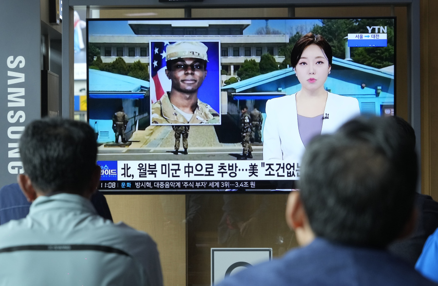 A TV screen shows a file image of American soldier Travis King during a news program at the Seoul Railway Station in Seoul, South Korea, Thursday, Sept. 28, 2023. The U.S. has secured the release of King who sprinted across a heavily fortified border into North Korea more than two months ago, and he is on his way back to America, officials announced Wednesday. U.S. ally Sweden and rival China helped with the transfer.