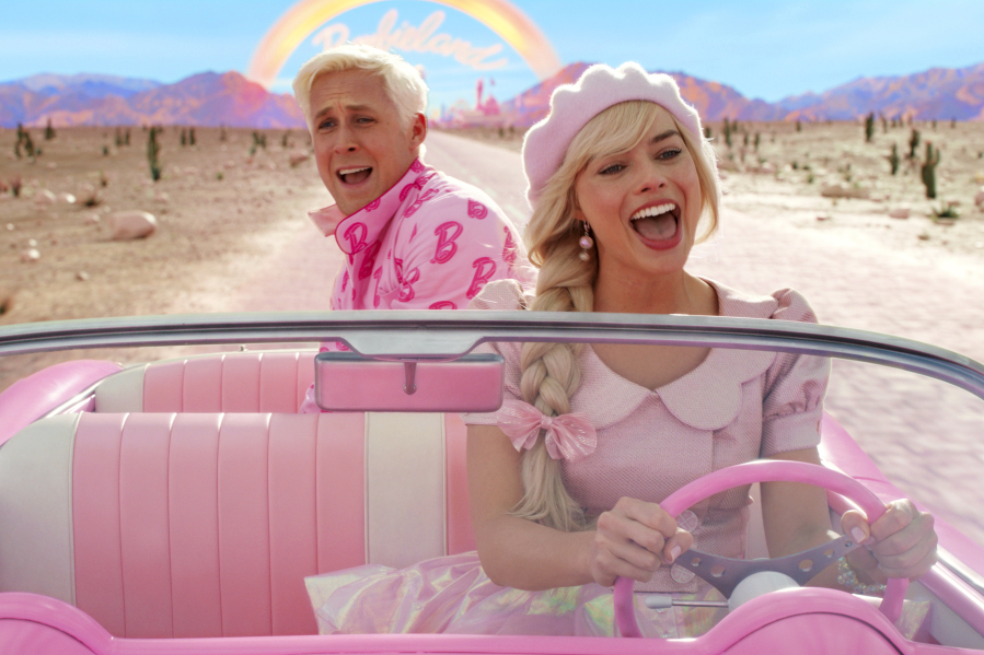 Ryan Gosling, left, and Margot Robbie in a scene from "Barbie." The hit movie will be available for streaming Tuesday. (Warner Bros.
