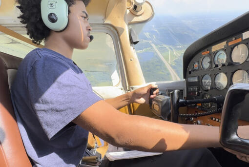 In a frame grab from video, Kyan Bovee flies over Detroit, Tuesday, Sept. 5, 2023. The Detroit teen is part of a program that teaches young people how to fly, while exposing them to careers in aviation and as pilots...areas people of color traditionally are underrepresented.