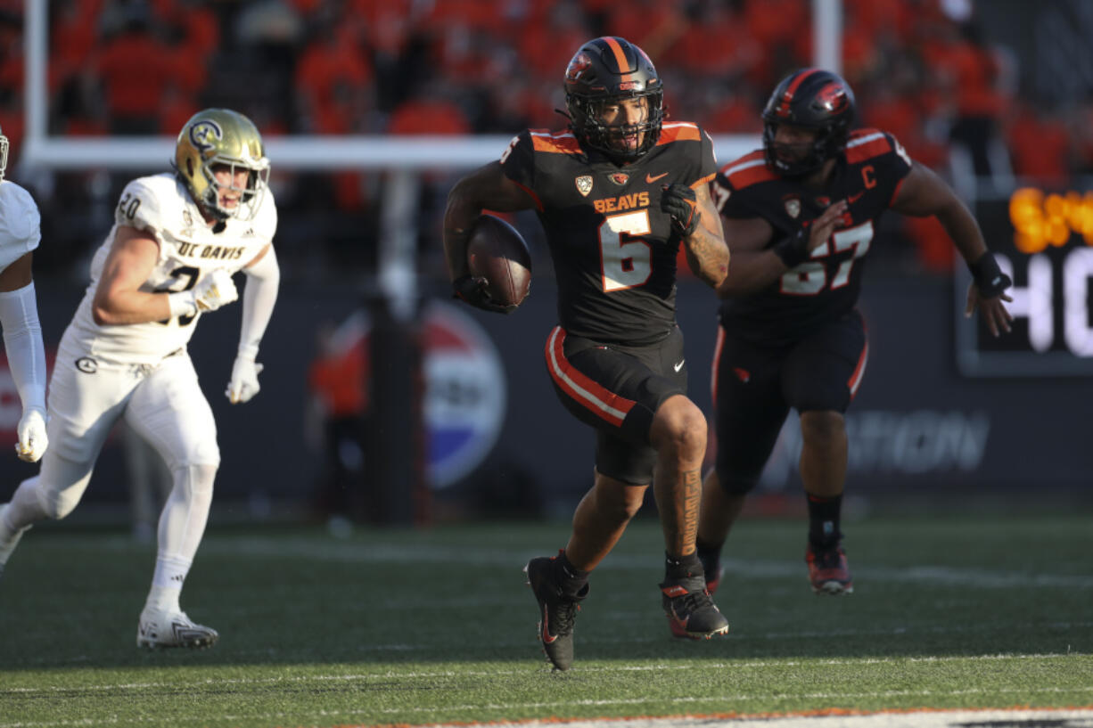 Oregon State running back Damien Martinez rushes against UC Davis during the first half of an NCAA college football game Saturday, Sept. 9, 2023, in Corvallis, Ore.