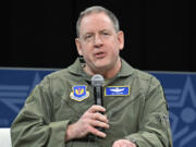 In this photo provided by the U.S. Air Force, Gen. James Hecker, commander of U.S. Air Forces in Europe, speaks at the Air and Space Forces Association 2023 Warfare Symposium in Aurora, Colo., March 8, 2023. The U.S. is making precautionary plans to evacuate two key drone and counter-terror bases in Niger if that becomes necessary under the West African nation's new ruling junta. That word came Friday from the Air Force commander for Africa, Gen. James Hecker. (Eric Dietrich/U.S.