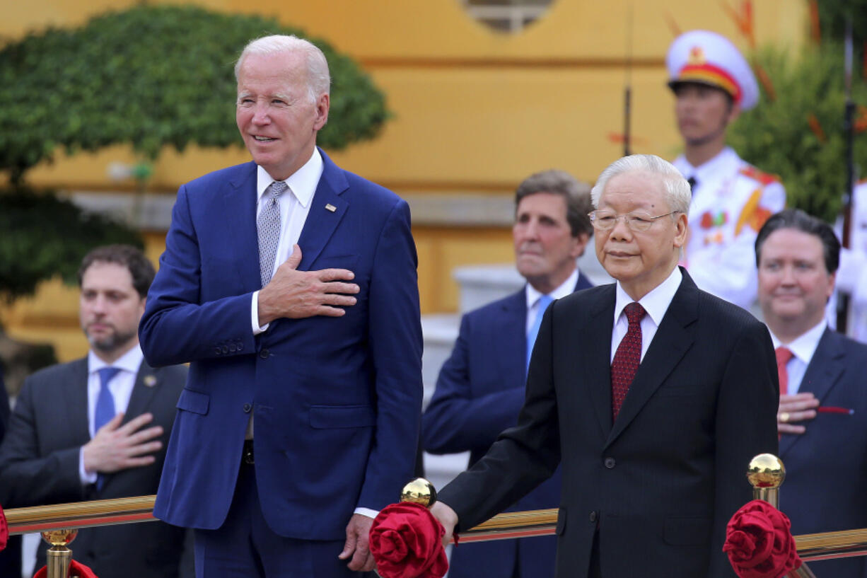 Vietnamese General Secretary of the Communist Party Nguyen Phu Trong, front right, and US President Joe Biden, front left, attend a military welcome ceremony at the Presidential Palace in Hanoi, Vietnam, Sunday, Sept.10, 2023. Biden is on an official two-day visit in Vietnam.