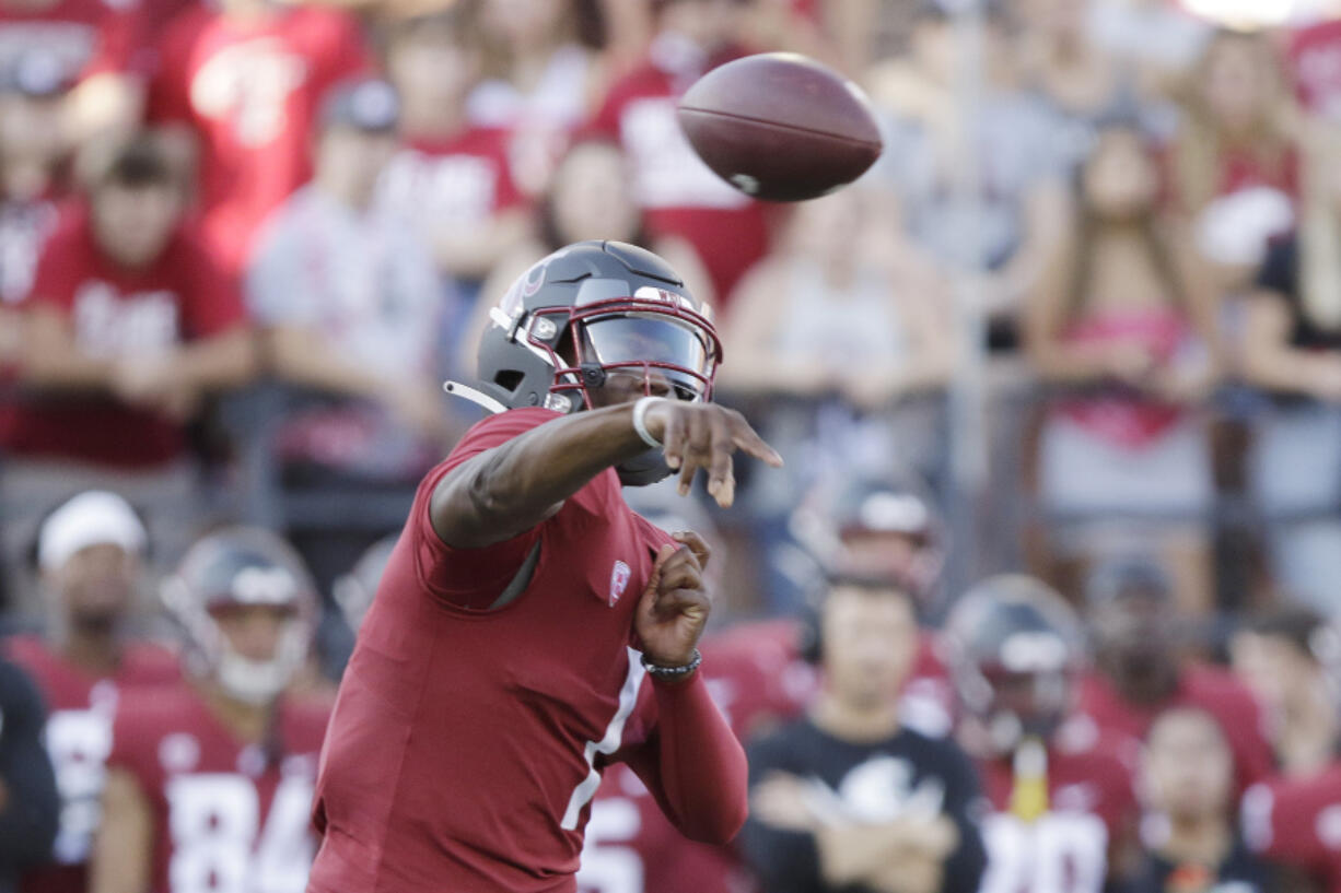 Washington State quarterback Cameron Ward throws a pass during the first half of an NCAA college football game against Wisconsin, Saturday, Sept. 9, 2023, in Pullman, Wash.