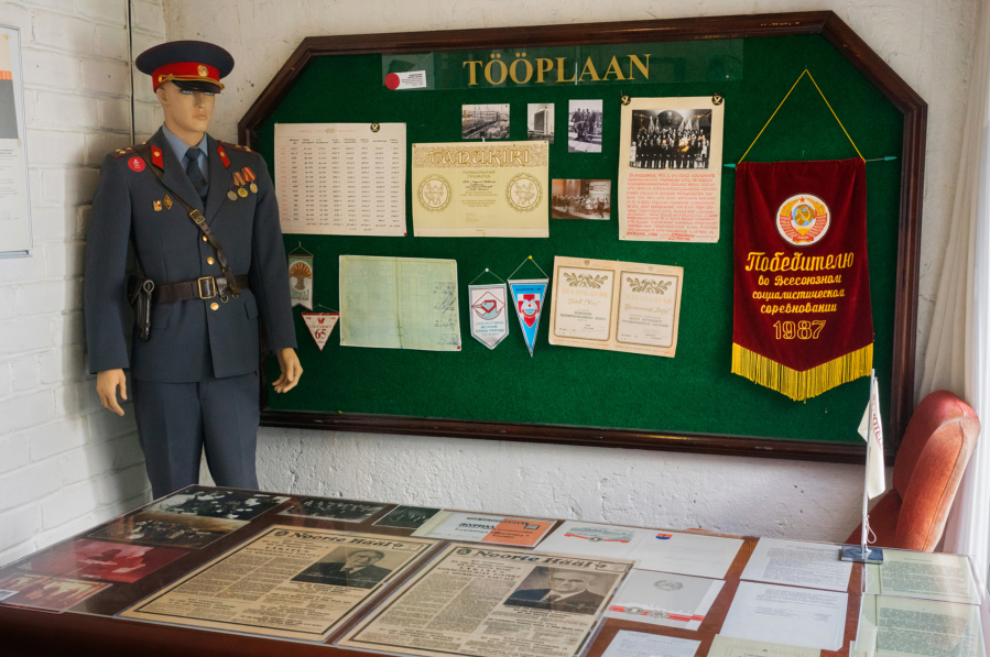 KGB agent uniform and desk with exhibition at the KGB Museum in Tallinn, Estonia.