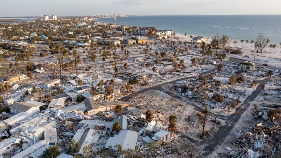 More than two months after Hurricane Ian's landfall, wreckage was abundant. An aerial view shows collapsed mobile homes in Fort Myers Beach on Dec. 4, 2022.