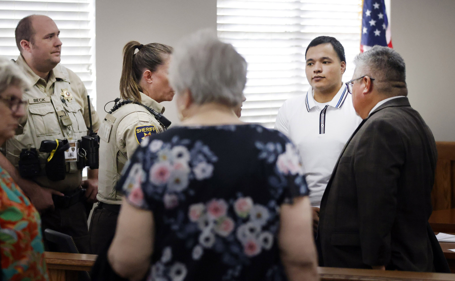 Defendant Jasinto Jimenez, 22, of Wichita Falls, Texas, (second from right) waits to be escorted from the court by bailiffs during a break in his felony murder case, which got underway at the Wichita County Court House on Sept. 26, 2023. Jimenez is charged with the murder of 21-year-old Andres Diaz, who died from fentanyl poisoning in July 2022. He is accused of selling fentanyl-laced pills that killed Diaz.