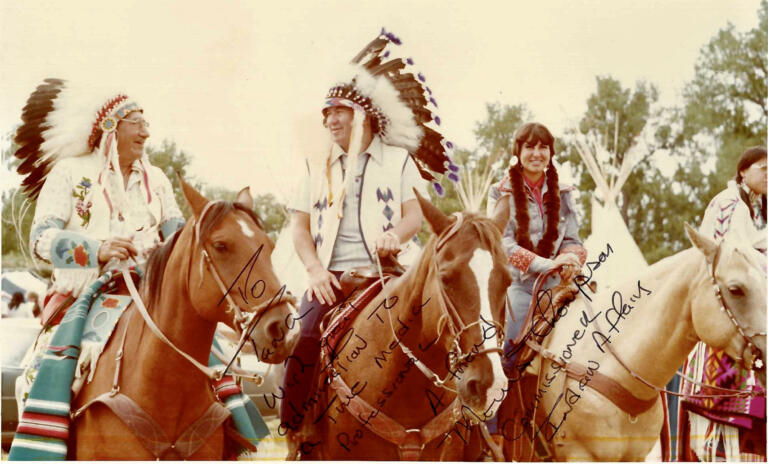 Public affairs officer Tanna (Chattin) Engdahl, at right, at a Bureau of Indian Affairs event in the 1970s with agency commissioner Morris Thompson, center.