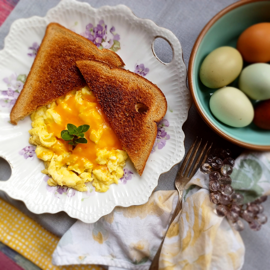 Scrambled eggs are the ultimate comfort food: easy to make and easy to eat (especially with cheddar cheese).