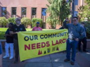 Supporters rally outside the Clark County Courthouse after a hearing for a preliminary injunction concerning the closure of Larch Corrections Center on Friday afternoon, Oct. 6, 2023.