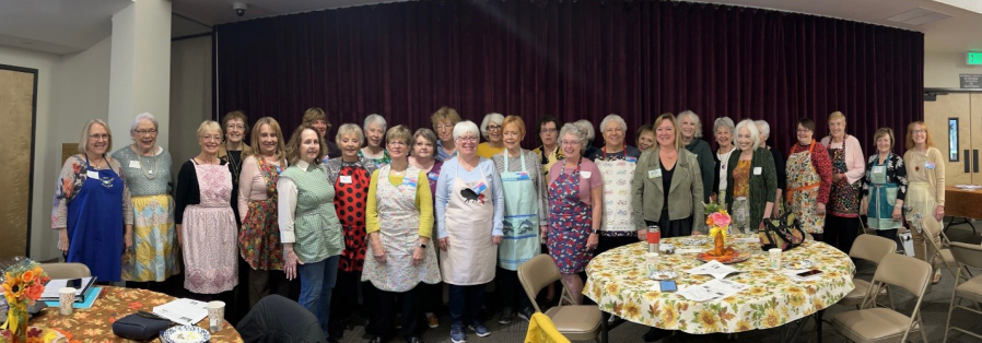 The Clark County Newcomers Club is planning a series of festive activities to celebrate the group's 70th anniversary, the first of which occurred at the club's October meeting where participants were encouraged to wear decorative aprons representing the last 70 years.